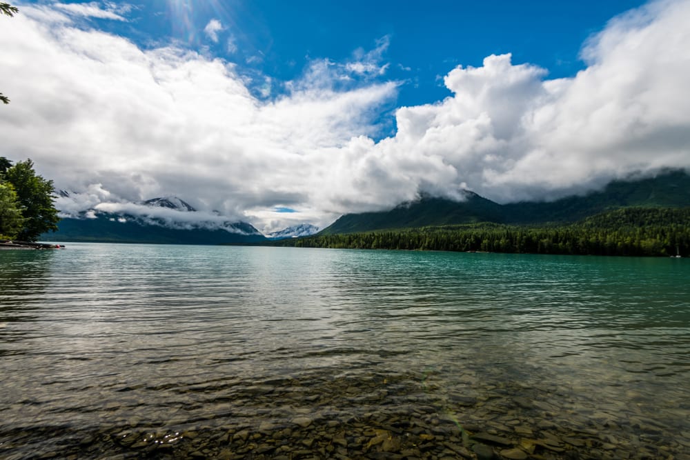 Alaska lake, clouds and mountains
