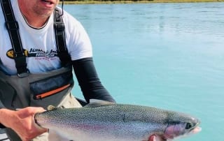 Man holding fish.