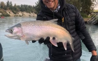 A proud angler displays his catch.