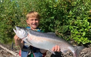 Taking kids fishing in Alaska is sure to lead to found memories.