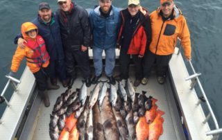 A group of anglers enjoy one of Jimmie Jack's Alaska fishing charters.