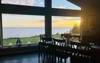 Alaska Luxury Fishing Lodge: An interior view of the Seascape Lodge from the perspective of looking out a window over the Cook Inlet.